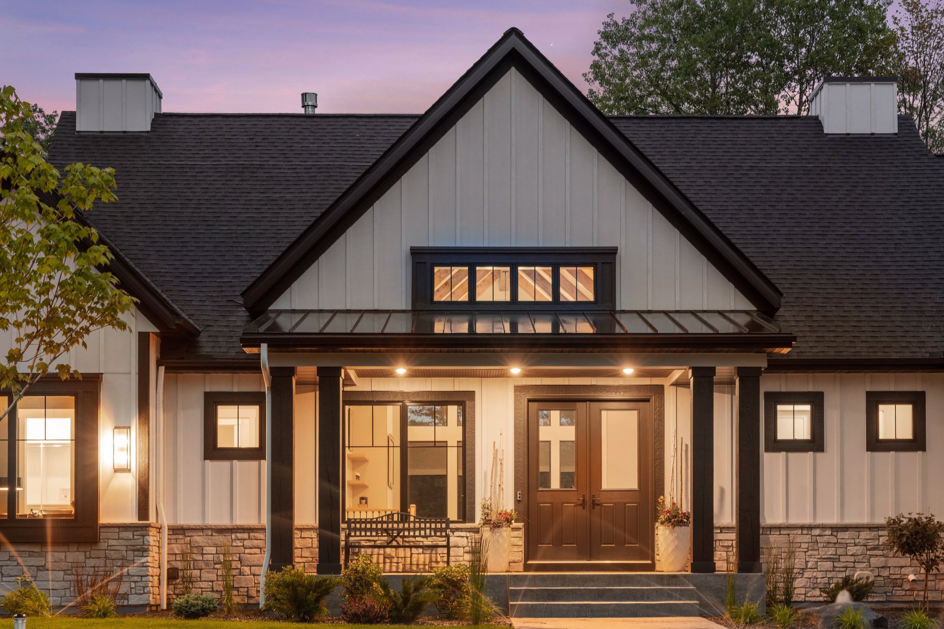 Home beautifully illuminated at dusk